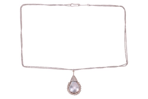 Lot 57 - A mabé pearl pendant, the pear-shaped pendant...