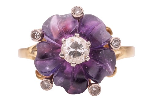 Lot 96 - A carved amethyst and diamond dress ring, with...