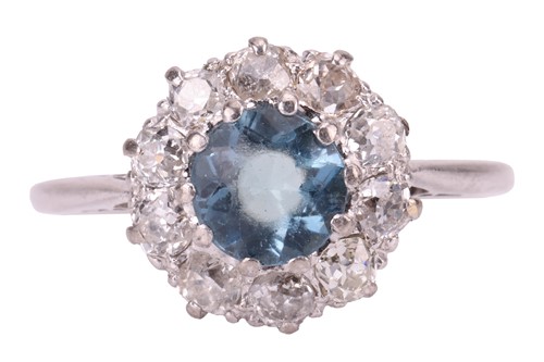 Lot 88 - An aquamarine and diamond cluster ring,...