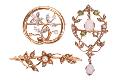 Lot 231 - Three Edwardian gem-set brooches; to include a...