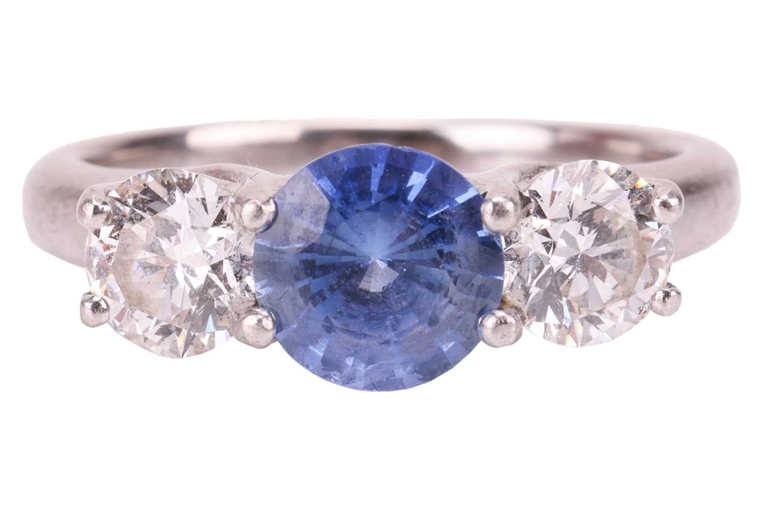 Lot 169 - A sapphire and diamond three-stone ring,...
