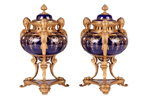 Lot 122 - A pair of Sevres style, ormolu mounted French...