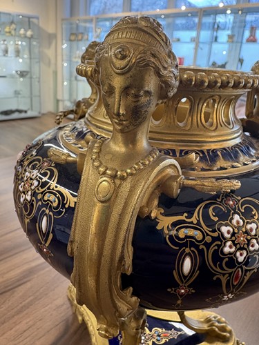 Lot 122 - A pair of Sevres style, ormolu mounted French...