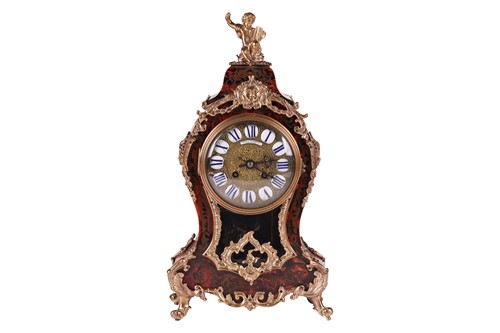 Lot 74 - A Louis XV-style red Boulle "Balloon" 8-day...