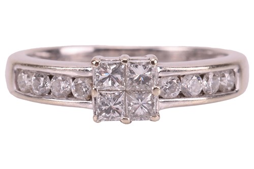 Lot 35 - A diamond cluster ring in 18ct white gold,...