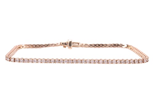 Lot 213 - Laboratory-grown diamond line bracelet,...