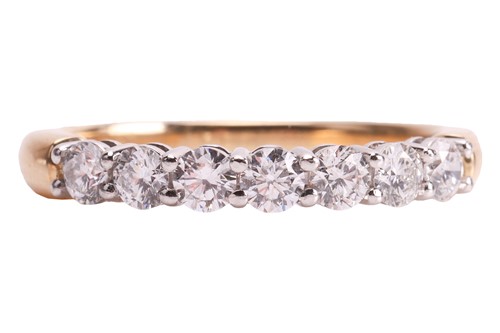 Lot 59 - Tiffany & Co - a diamond half-eternity ring,...