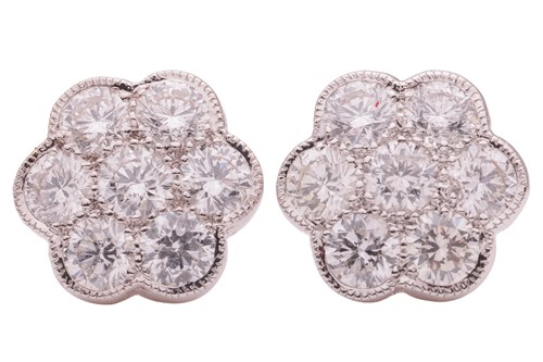 Lot 13 - A pair of diamond-set floral cluster earrings,...