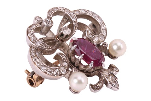 Lot 13 - A late Victorian gem-set brooch, of scrollwork...