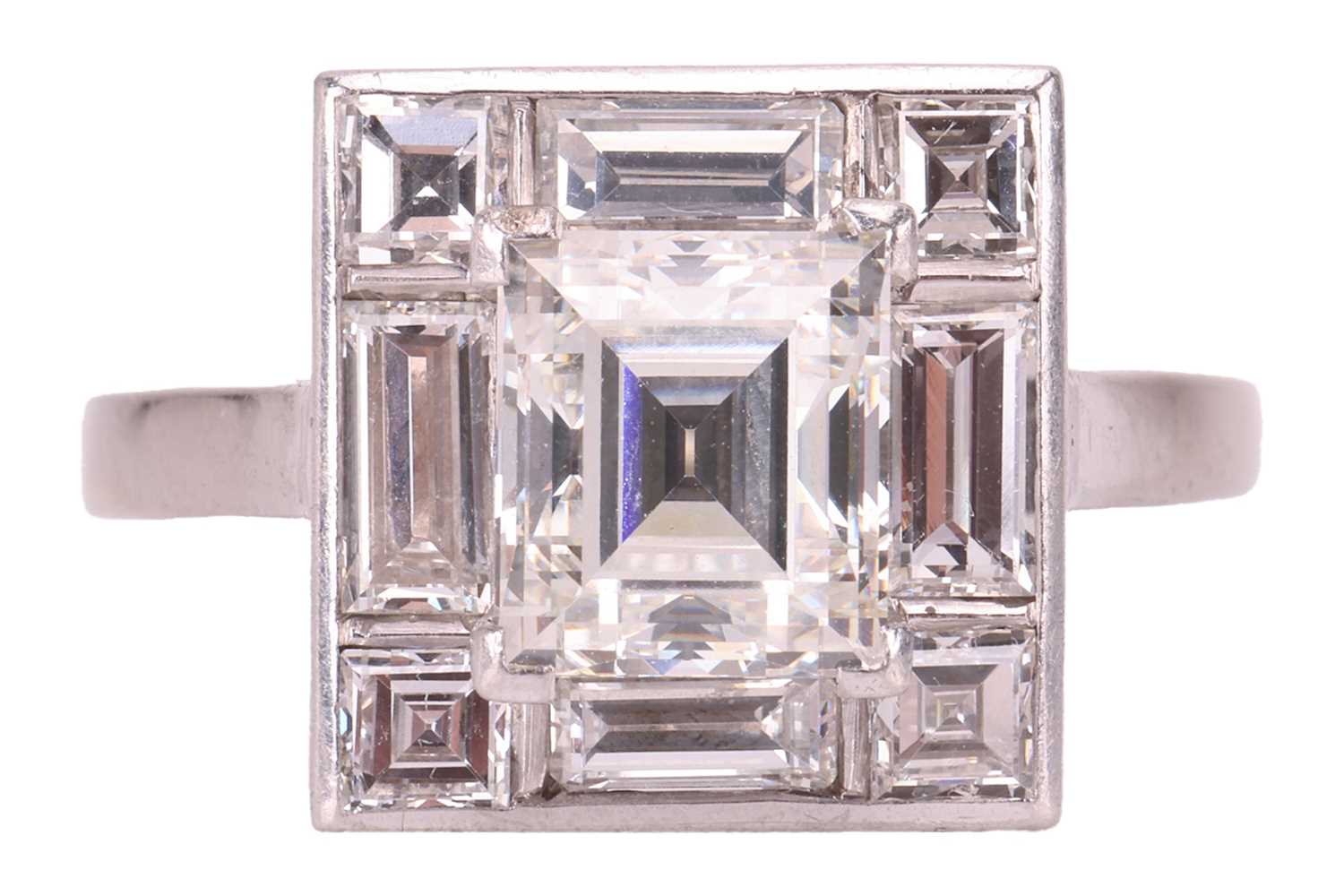 Lot 227 - A diamond square cluster ring, with...