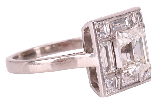 Lot 227 - A diamond square cluster ring, with...