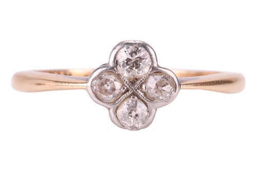 Lot 24 - A four-stone diamond cluster ring, set with...