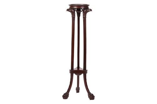 Lot 64 - A Neoclassical style carved mahogany torchere,...