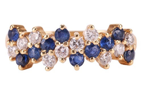 Lot 2 - An 18ct sapphire and diamond line ring, with...