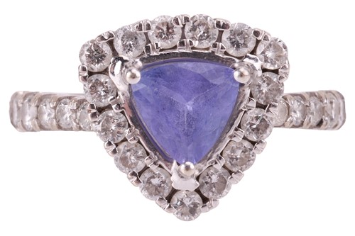 Lot 218 - A tanzanite and diamond cluster ring, centred...