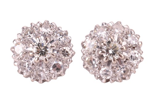 Lot 46 - A pair of diamond cluster earrings, each with...