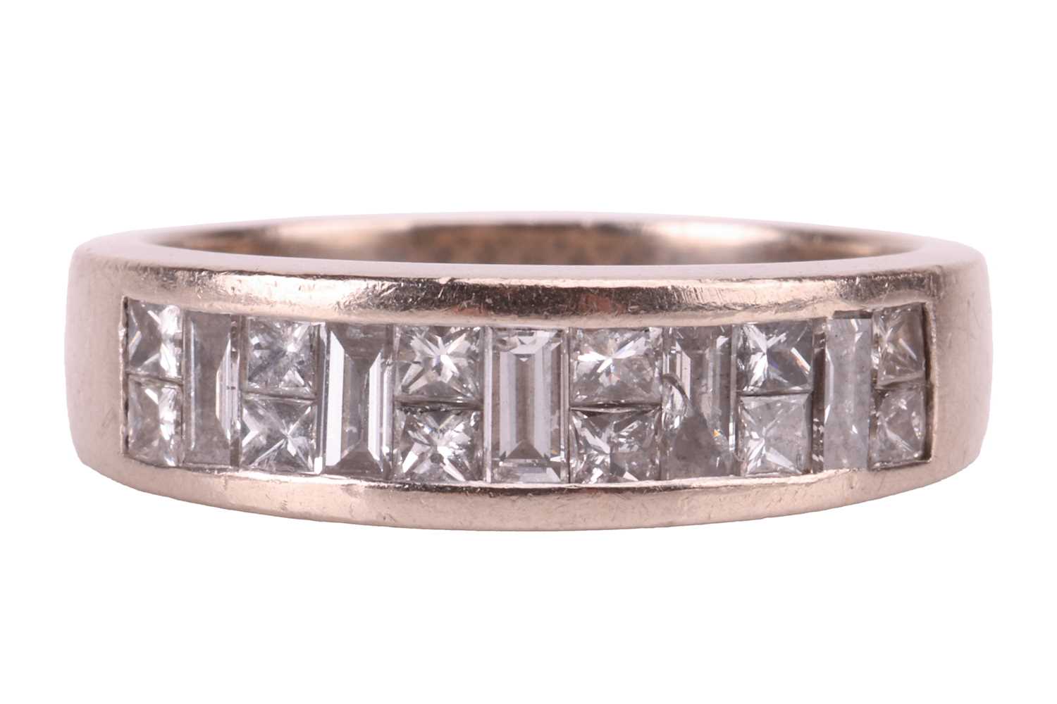 Lot 42 - A diamond-set half hoop ring in 18ct white...