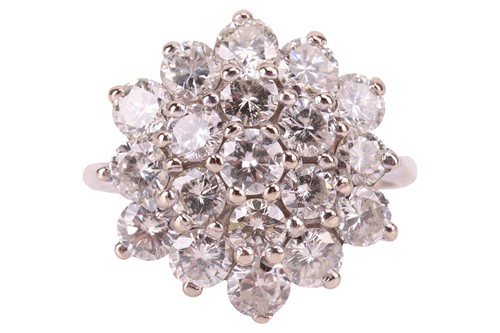 Lot 127 - A diamond-set floral cluster ring, featuring...