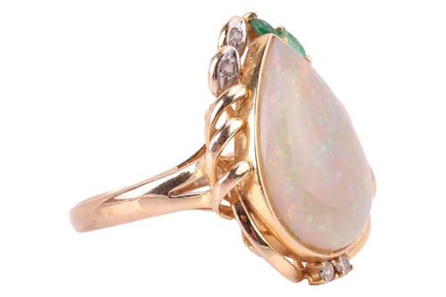 Lot 64 - An opal dress ring, collet-set with a...