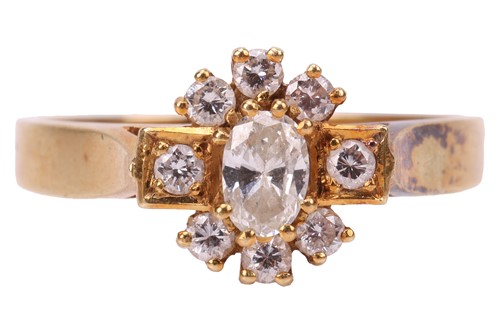 Lot 130 - An 18ct diamond cluster ring, set with a...