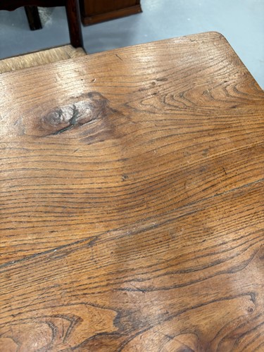 Lot 126 - A French provincial Fruitwood farmhouse table,...