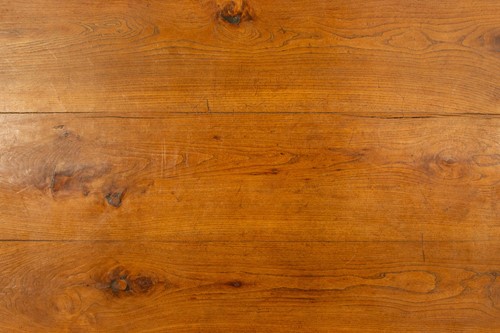 Lot 126 - A French provincial Fruitwood farmhouse table,...