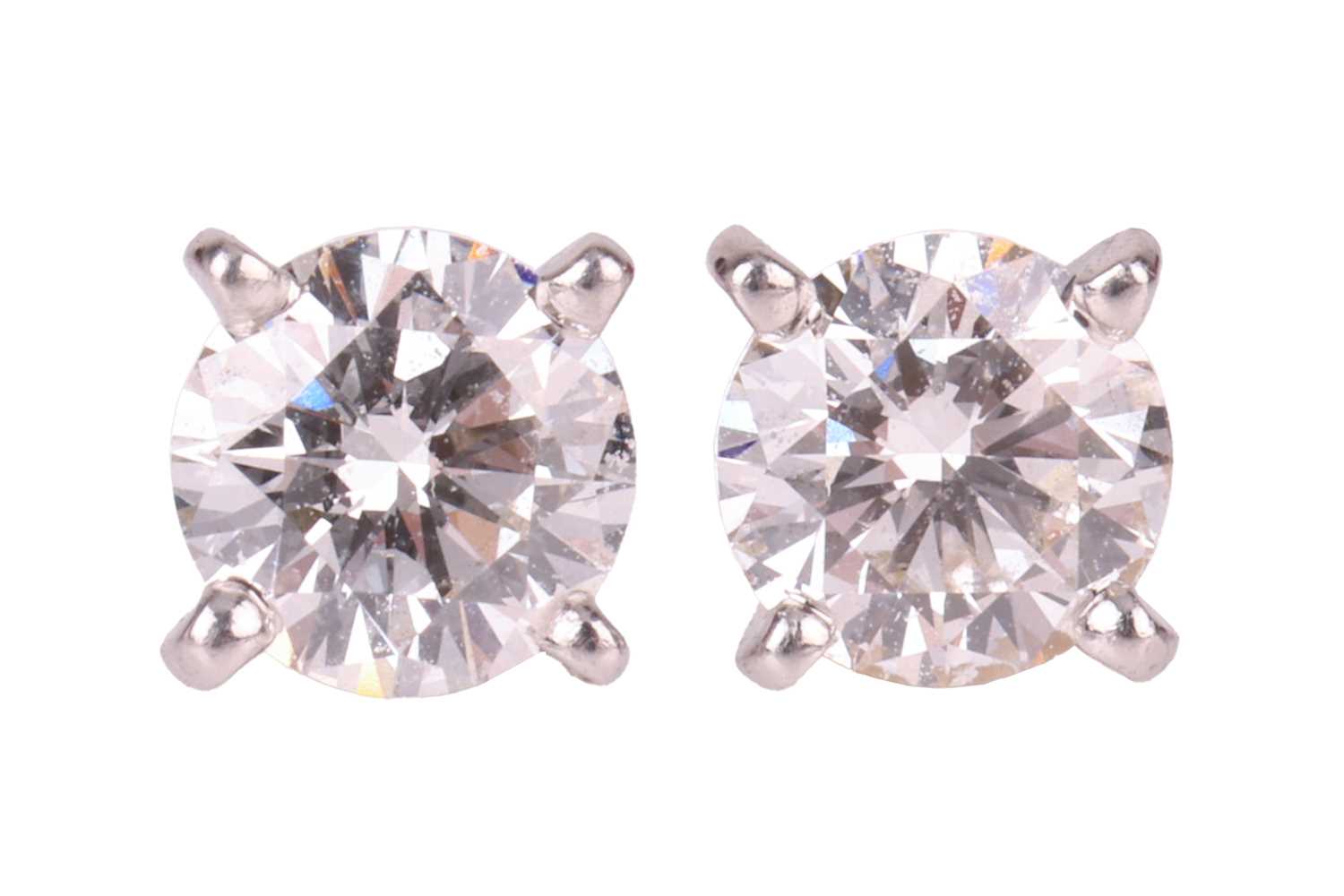 Lot 51 - Cartier – A pair of diamond stud earrings,...