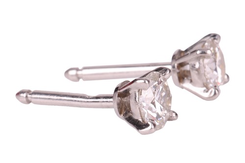 Lot 51 - Cartier – A pair of diamond stud earrings,...