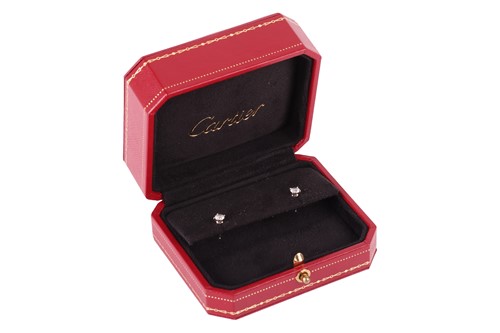 Lot 51 - Cartier – A pair of diamond stud earrings,...