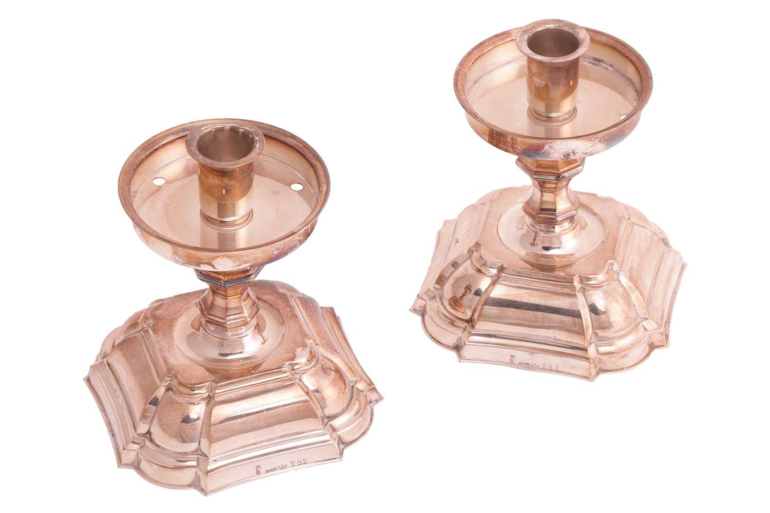 Lot 58 - A pair of Danish silver-plated candlesticks,...