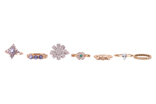 Lot 39 - A collection of seven gem-set rings; to...