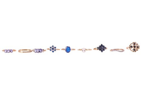 Lot 151 - A collection of nine gem-set rings in 9ct gold;...