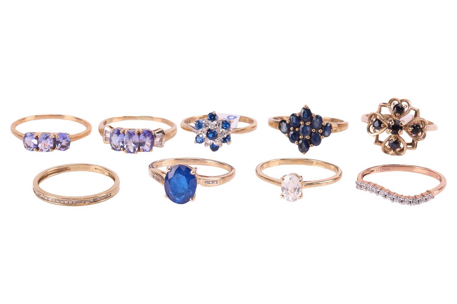 Lot 151 - A collection of nine gem-set rings in 9ct gold;...