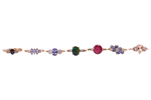 Lot 24 - A collection of seven gem-set rings in 9ct...