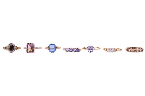 Lot 17 - A group of seven gem-set dress rings; to...