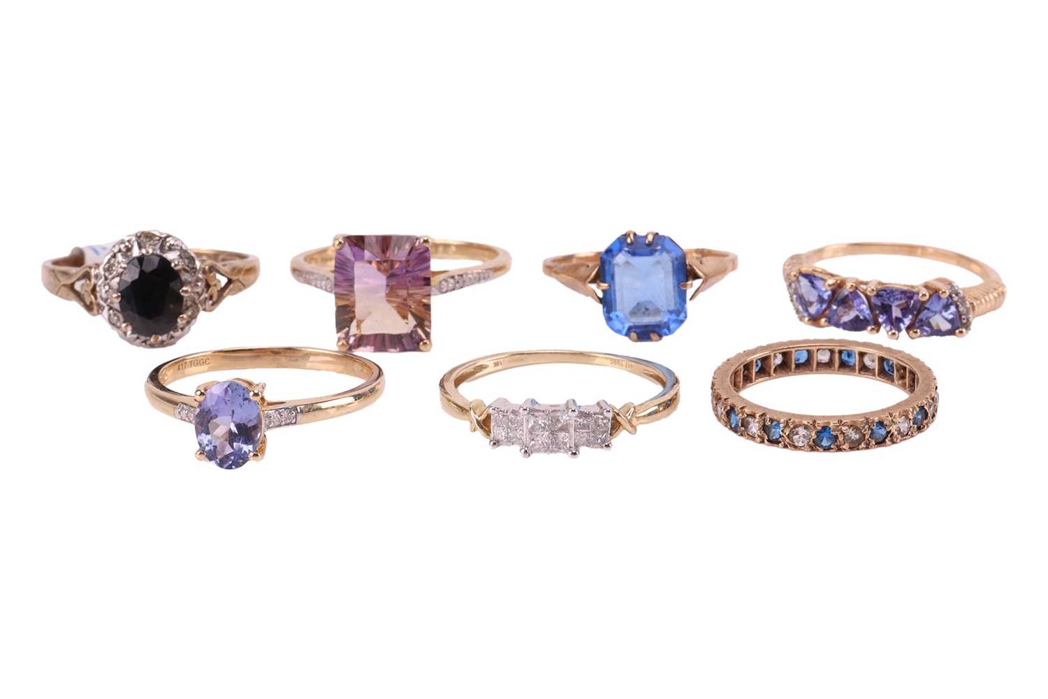 Lot 17 - A group of seven gem-set dress rings; to...