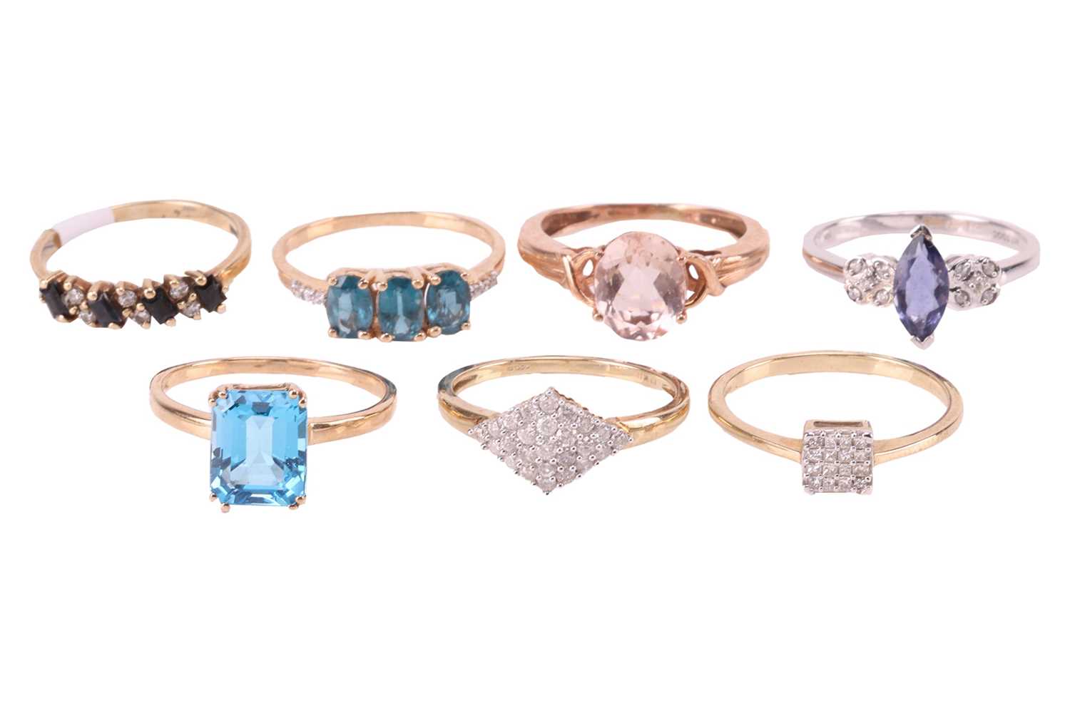 Lot 147 - A group of seven gem-set rings in 9ct gold; to...