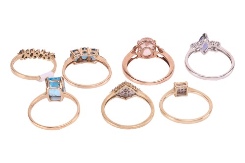 Lot 147 - A group of seven gem-set rings in 9ct gold; to...