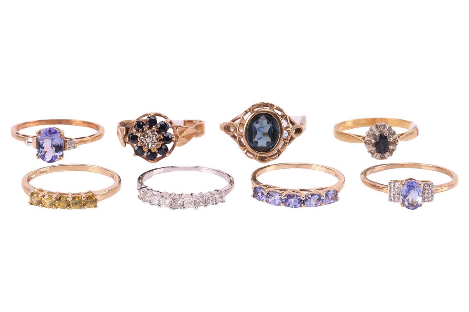 Lot 30 - A collection of eight gem-set rings; to