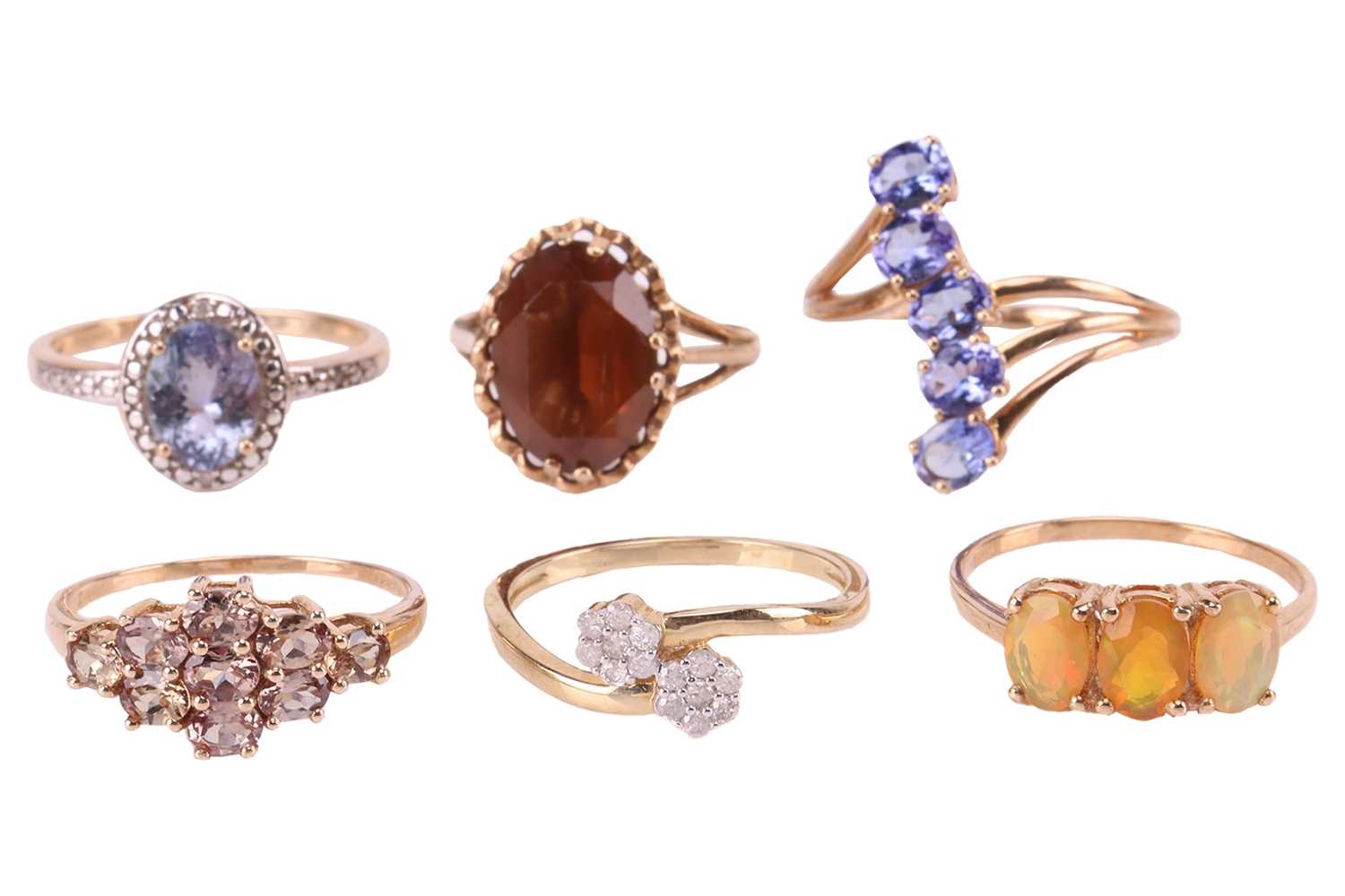 Lot 36 - A group of six gem-set rings in 9ct gold; to