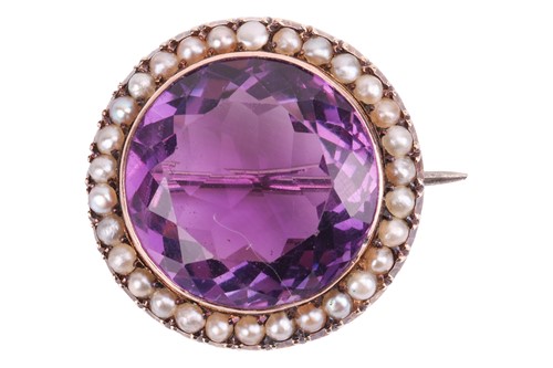 Lot 31 - A large amethyst and seed pearl cocktail ring,...