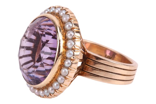 Lot 31 - A large amethyst and seed pearl cocktail ring,...