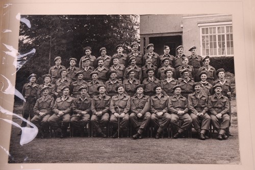 Lot 261 - A collection of militaria including a George...