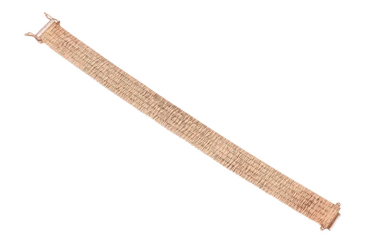 Lot 31 - A 9ct gold textured brick-link bracelet,...
