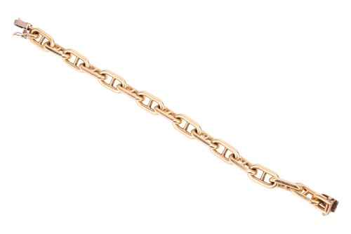 Lot 55 - An anchor link chain bracelet in 18ct gold,...