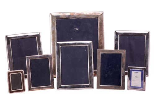 Lot 142 - A collection of seven silver photograph frames,...