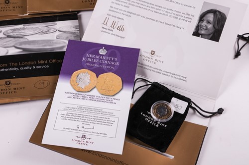 Lot 102 - A large group of commemorative coin sets, to...