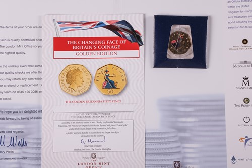Lot 102 - A large group of commemorative coin sets, to...