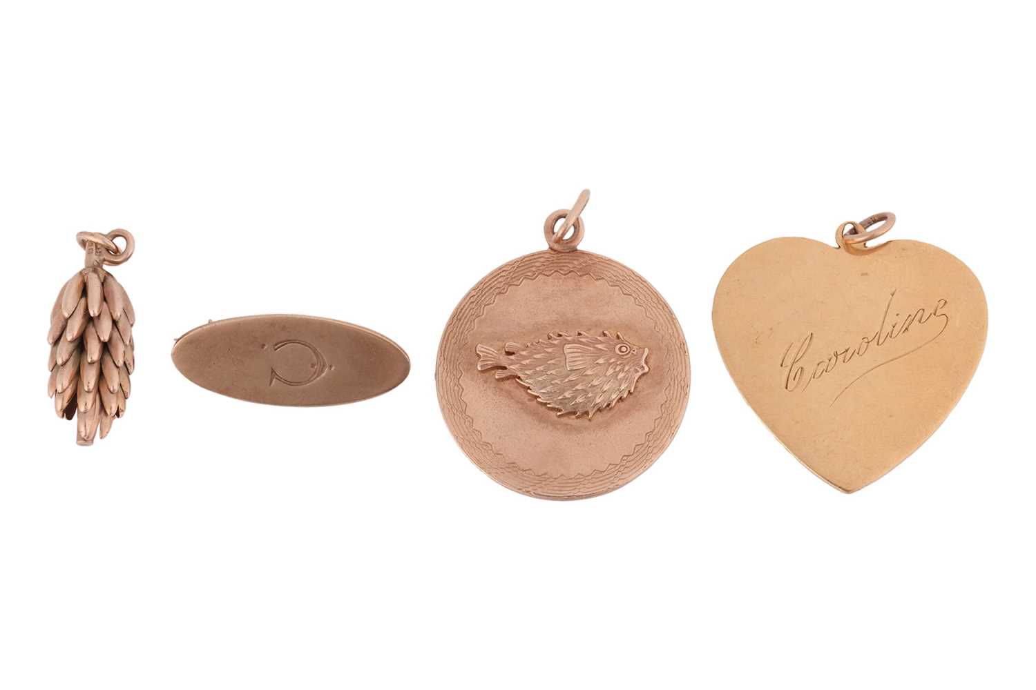 Lot 35 - Three pendants and a brooch; to include a...