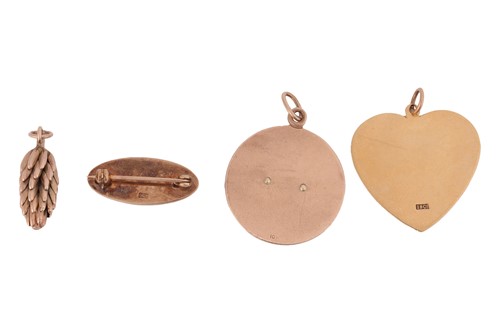 Lot 35 - Three pendants and a brooch; to include a...